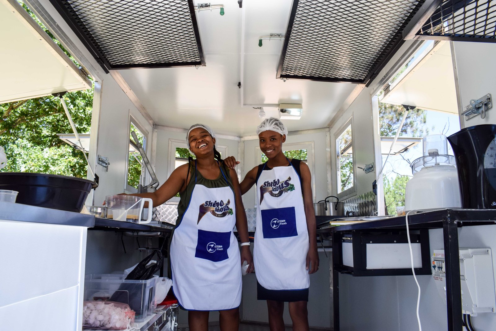 The Zeeterian Foods team inside the Shebo on Wheels trailer